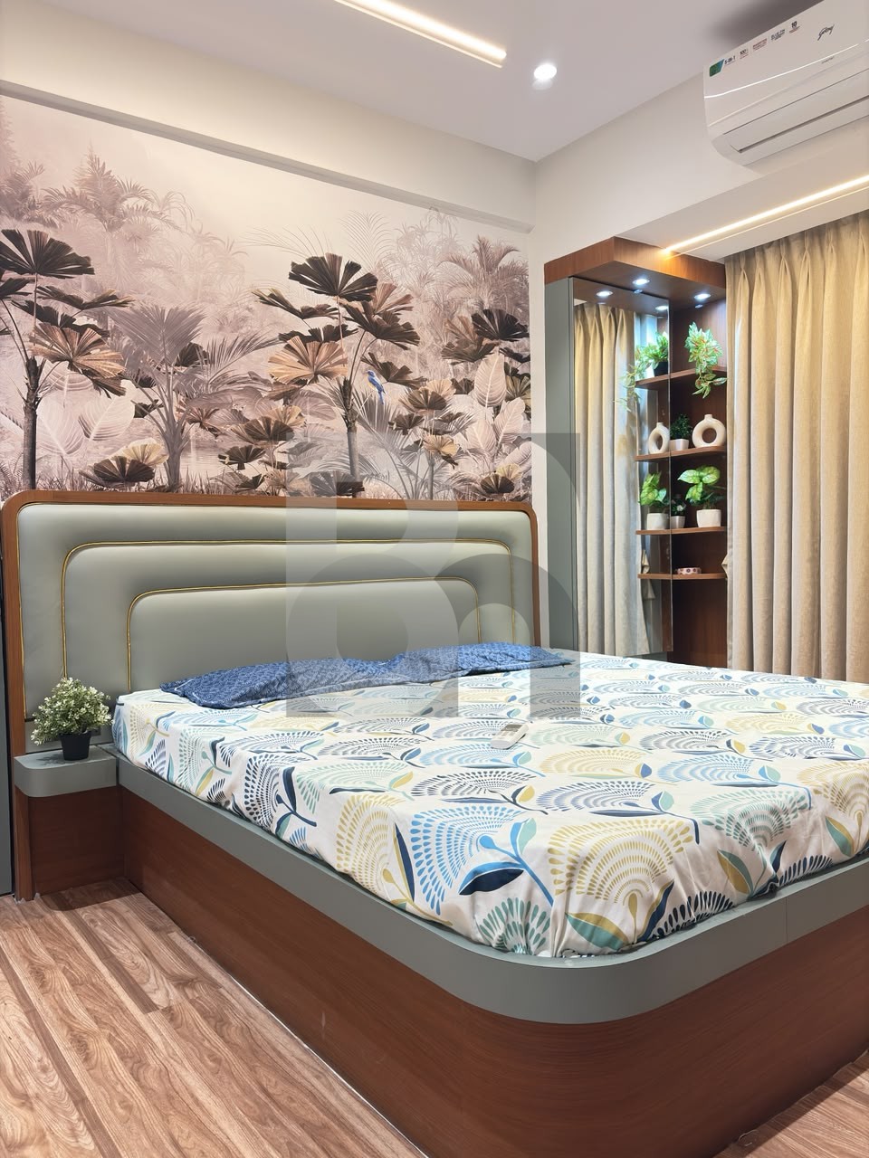 Master bedroom with tropical palm leaf wallpaper and illuminated vanity unit by Brand Meter, Vashi
