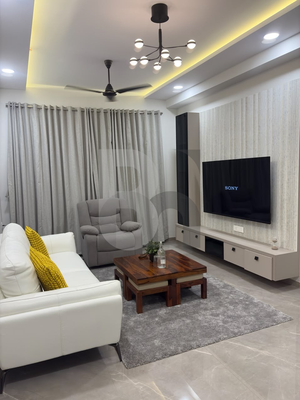 Contemporary living room TV unit with vertical fluted wall panel and floating console by Brand Meter