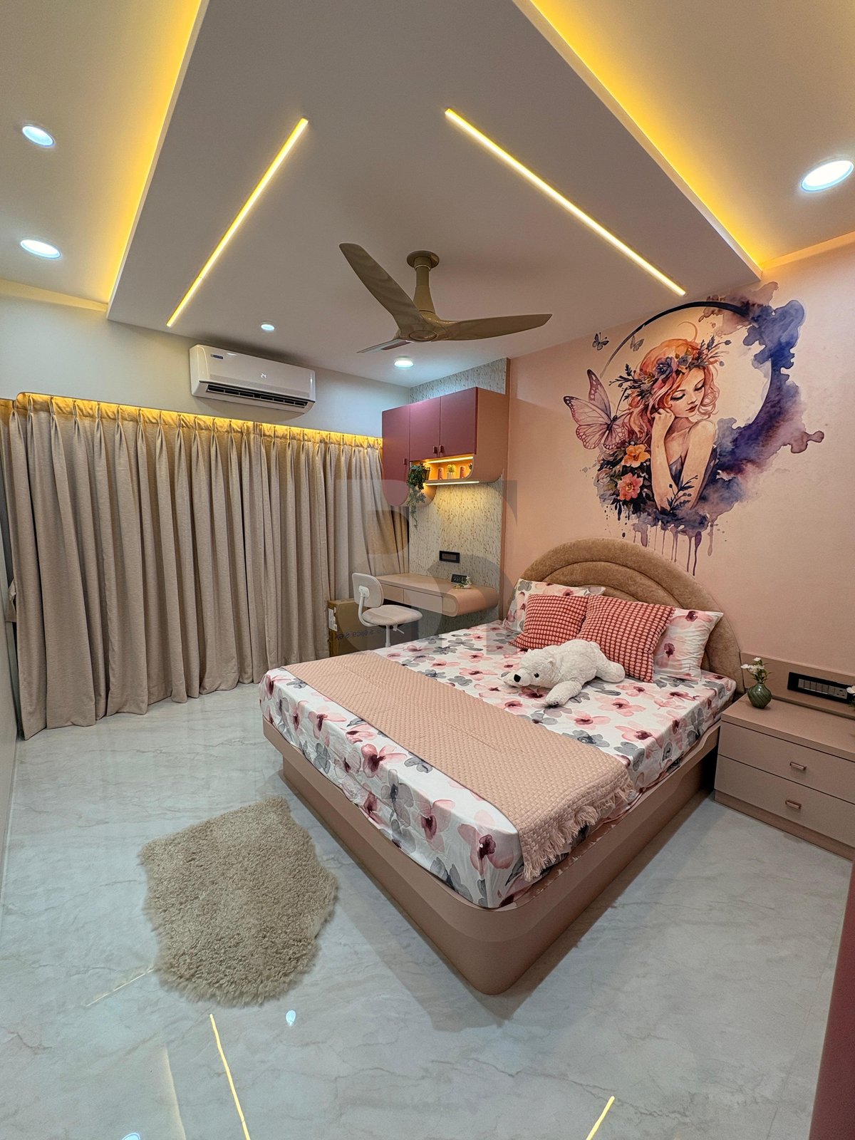 Dreamy kids bedroom with artistic fairy watercolor wall mural, curved headboard, and linear ceiling lights by Brand Meter