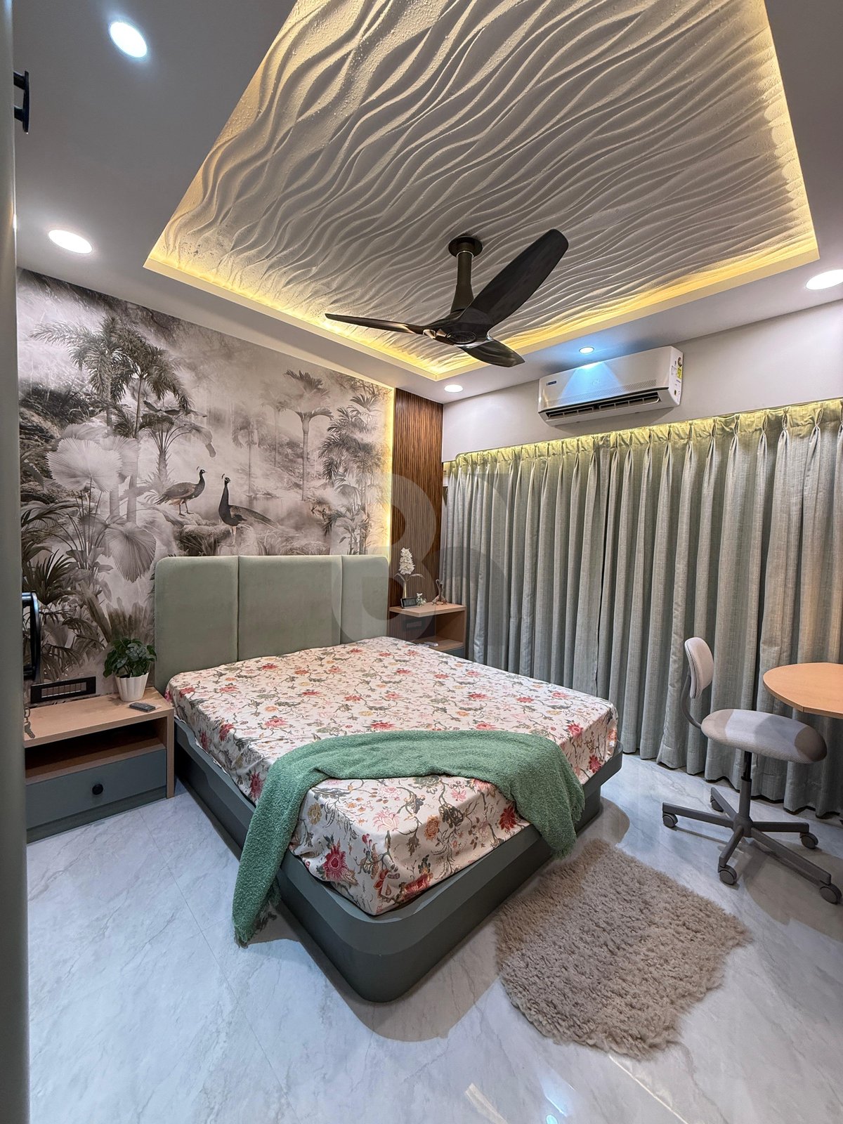 Master bedroom with nature-inspired peacock wall mural, wave acoustic ceiling, and ambient cove illumination by Brand Meter