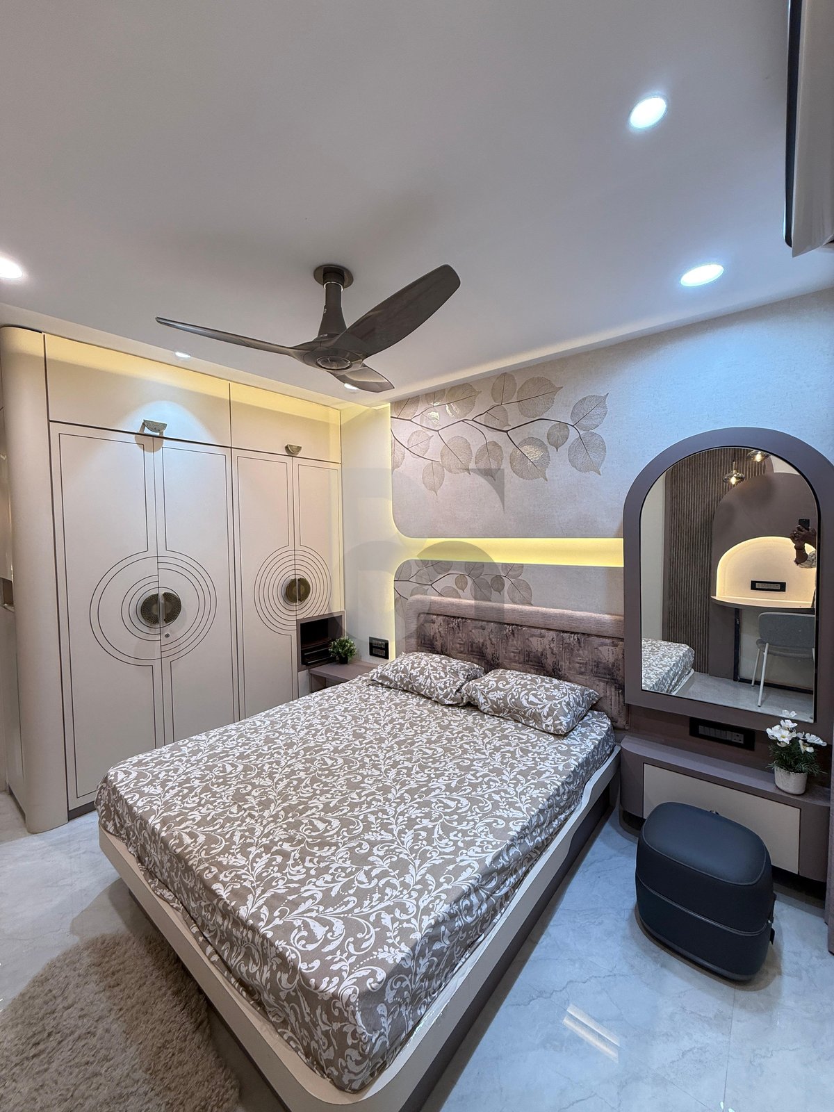 Master bedroom complete view with large sliding wardrobe, dressing stool, and botanical feature wall by Brand Meter, Navi Mumbai